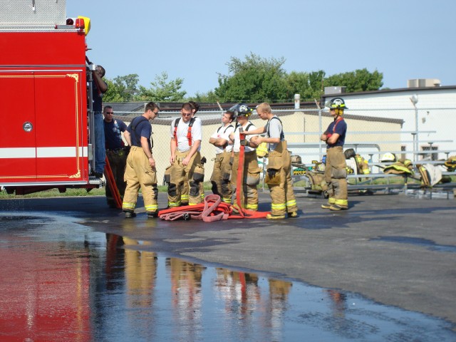 Traditions Training instructors teaching us how to pack our 400ft minuteman hose load.