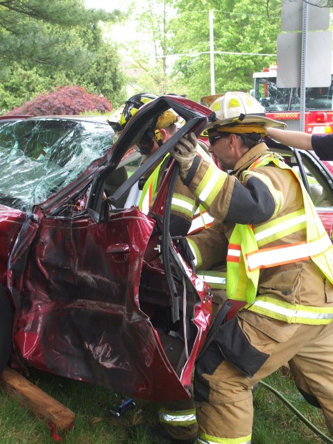 Rescue crews extricating an injured driver on Rt. 1